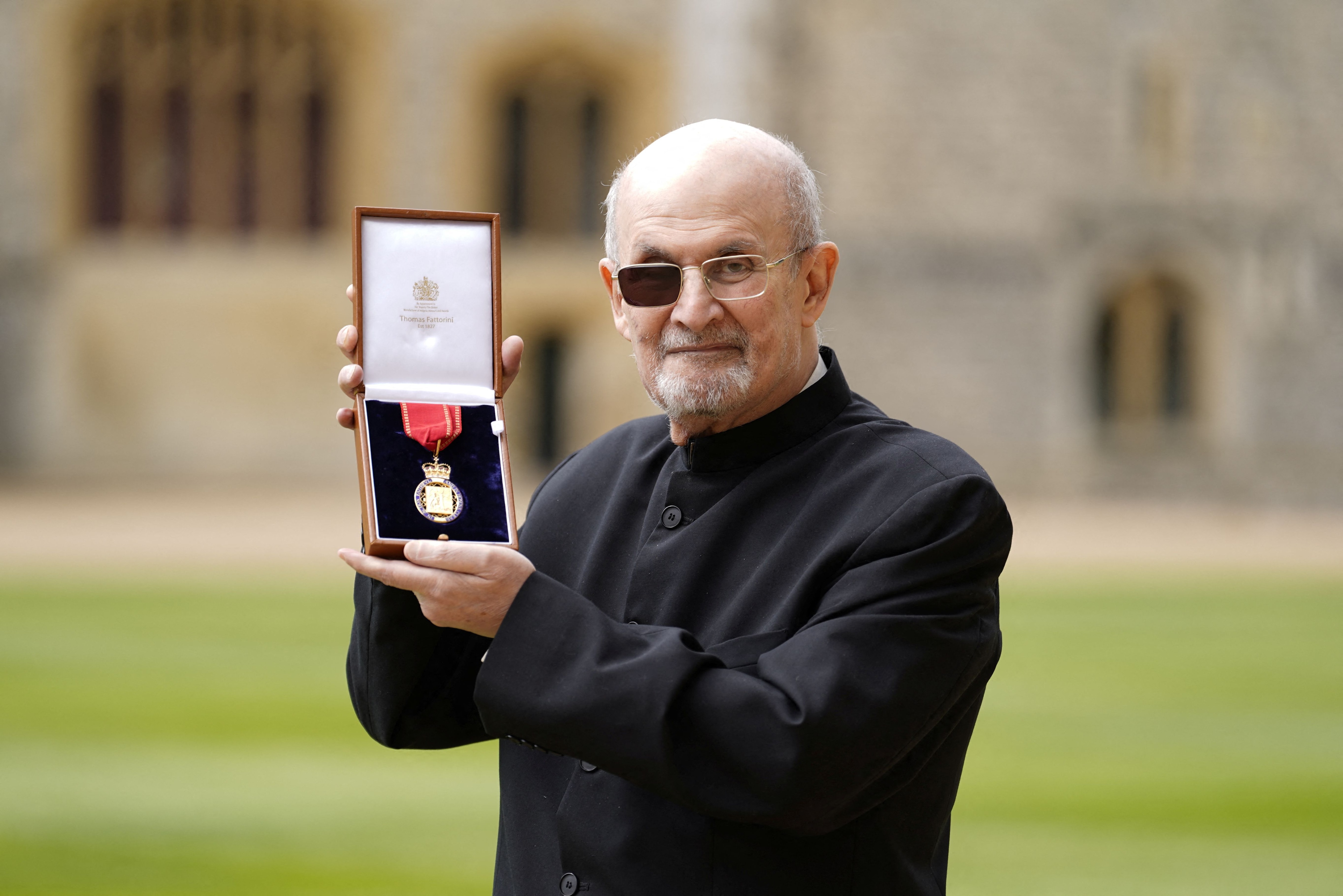Salman Rushdie during one of his last public appearances during the ceremonial investiture in which he was declared "Companion of Honour" at Windsor Castle Great Britain. 