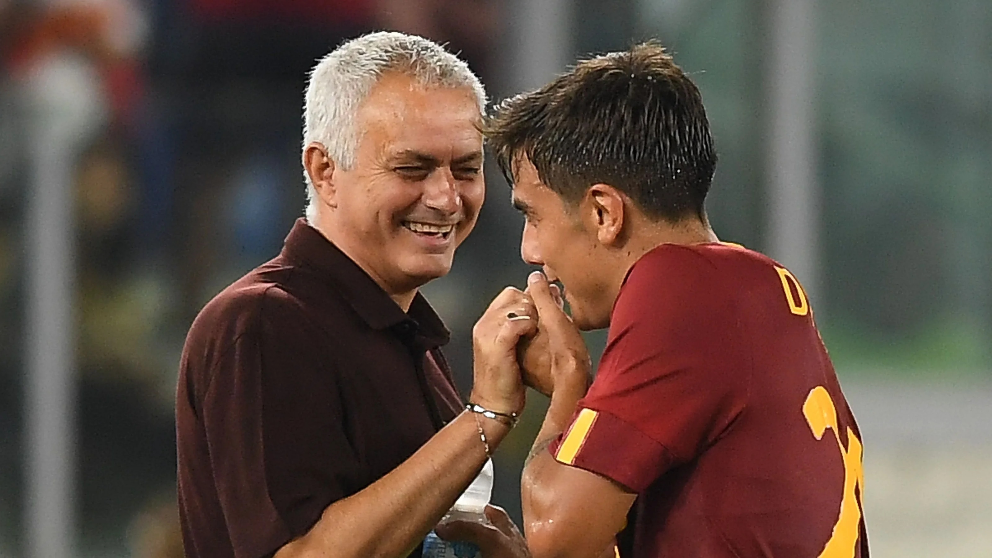 ROME, ITALY - AUGUST 30: Paulo Dybala of AS Roma greets Jose Mourinho head coach of AS Roma and kisses his hand during the Serie A match between AS Roma and AC Monza at Stadio Olimpico on August 30, 2022 in Rome, Italy.  (Photo by Silvia Lore/Getty Images)
