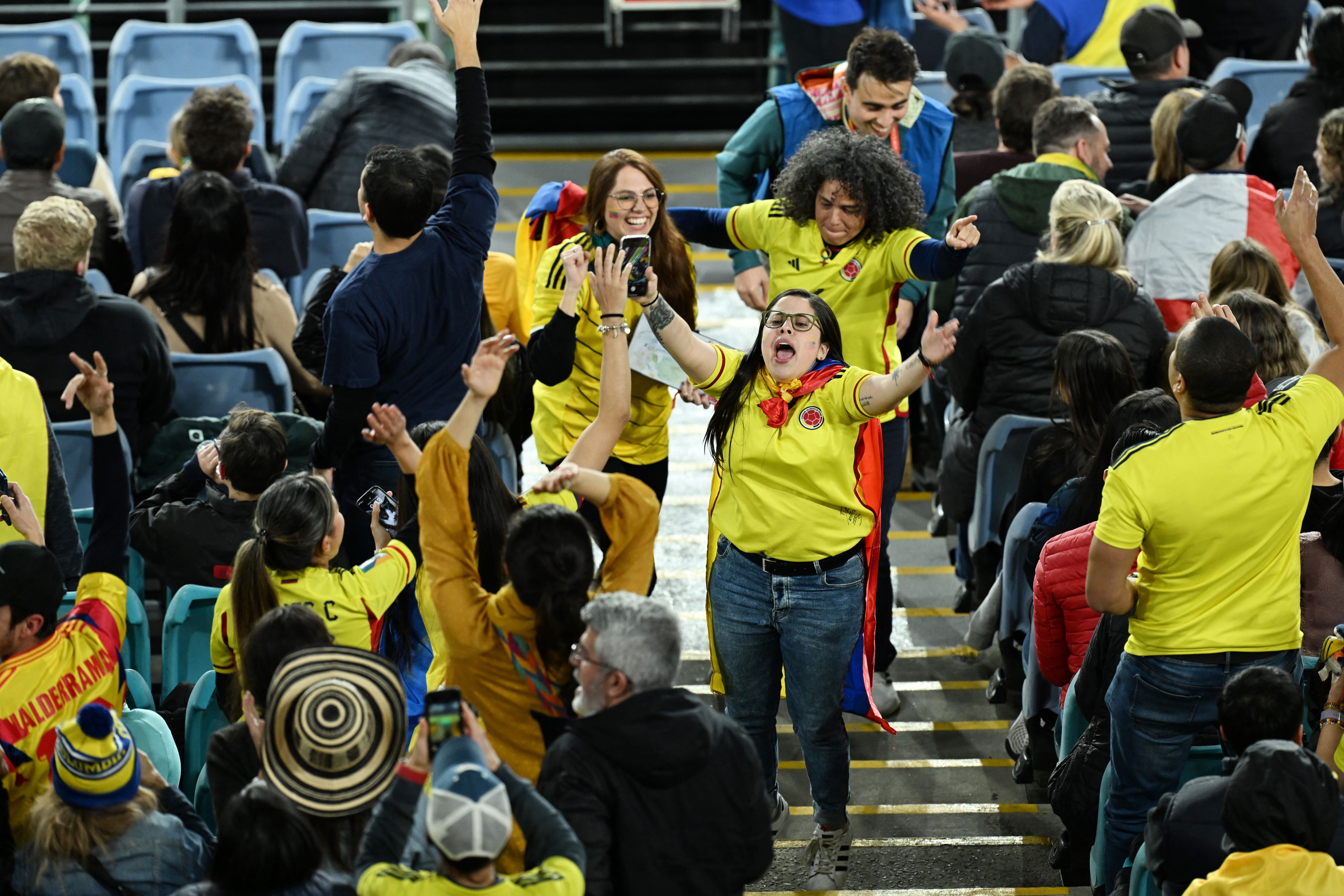 The Colombian fans celebrate against England.  REUTERS/Jaimi Joy