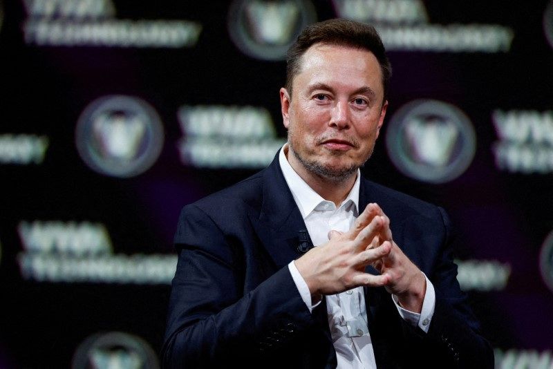FILE PHOTO: Elon Musk, CEO of SpaceX and Tesla and owner of Twitter, gestures as he attends the Viva Technology conference dedicated to innovation and startups at the Porte de Versailles exhibition center in Paris, France.  June 16, 2023. REUTERS/Gonzalo Fuentes