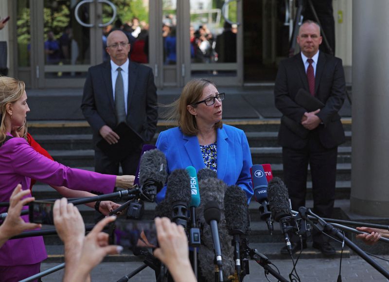 The US ambassador to Russia, Lynne Tracy, addresses the media at the gates of a court after a hearing in which an appeal against the detention of Wall Street Journal journalist Evan Gershkovich was considered, arrested in March when was conducting a report and accused of espionage, in Moscow, Russia, June 22, 2023. REUTERS/Evgenia Novozhenina/File Photo