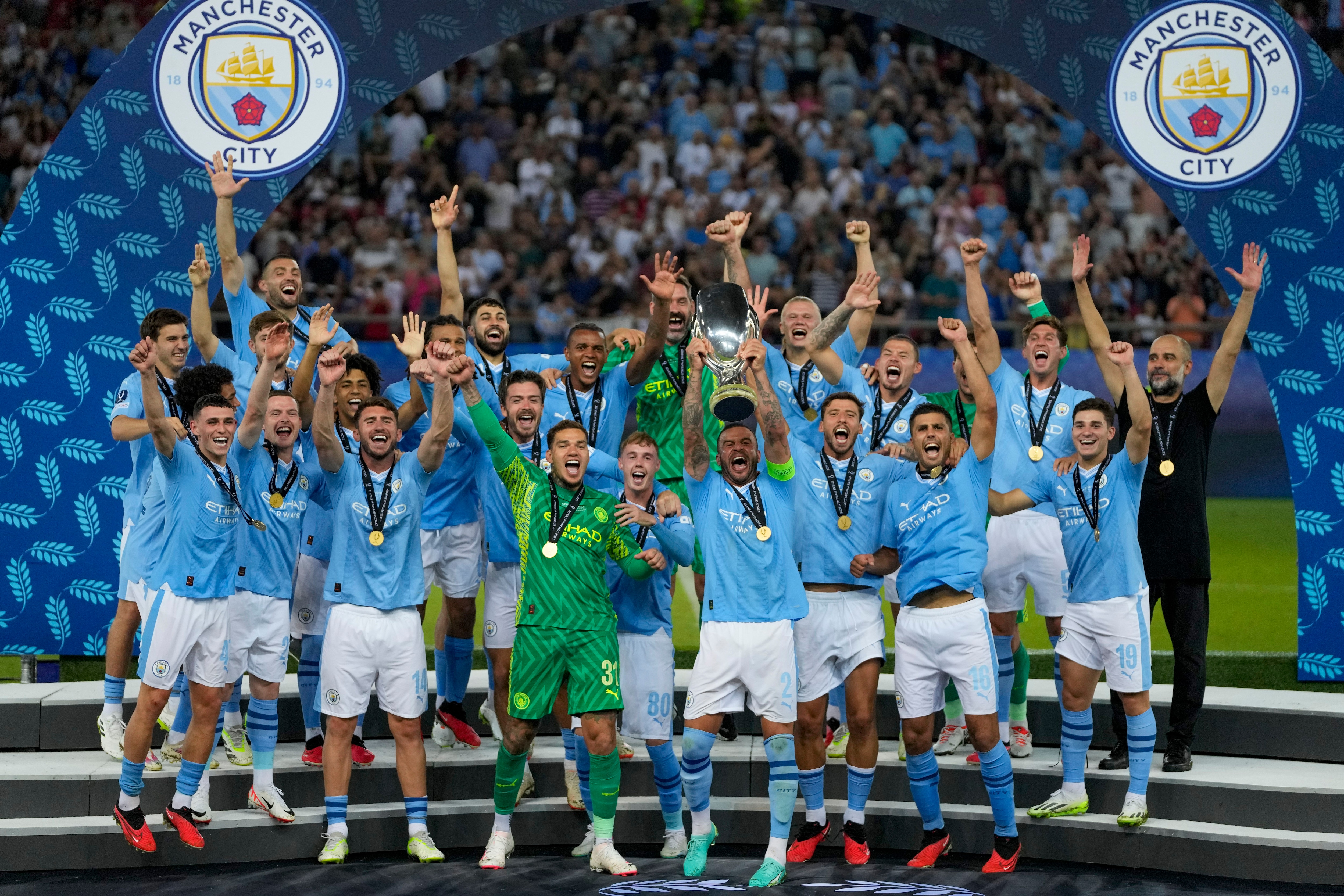 Manchester City players celebrate after winning the UEFA Super Cup against Sevilla, Wednesday, Aug. 16, 2023, in Athens (AP Photo/Thanassis Stavrakis)
