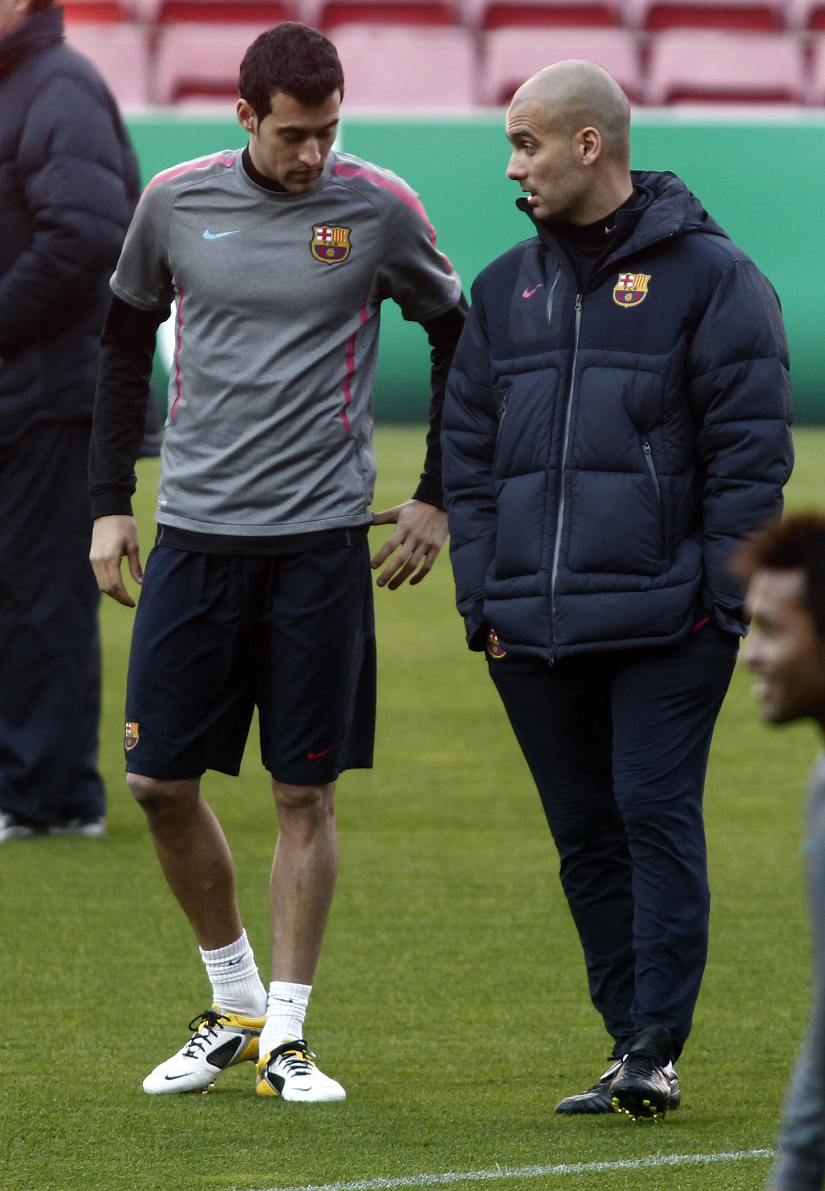 Guardiola with Sergio Busquets, during his stage at FC Barcelona
