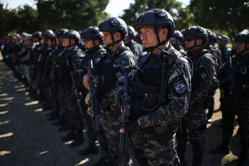 Police prepare for a patrol in Soyapango, El Salvador (REUTERS/Jose Cabezas)