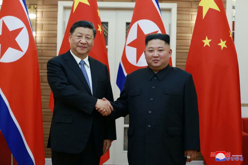 North Korean leader Kim Jong Un shakes hands with Chinese President Xi Jinping in Pyongyang, North Korea in this photo released June 21, 2019 by KCNA.  KCNA via REUTERS/File