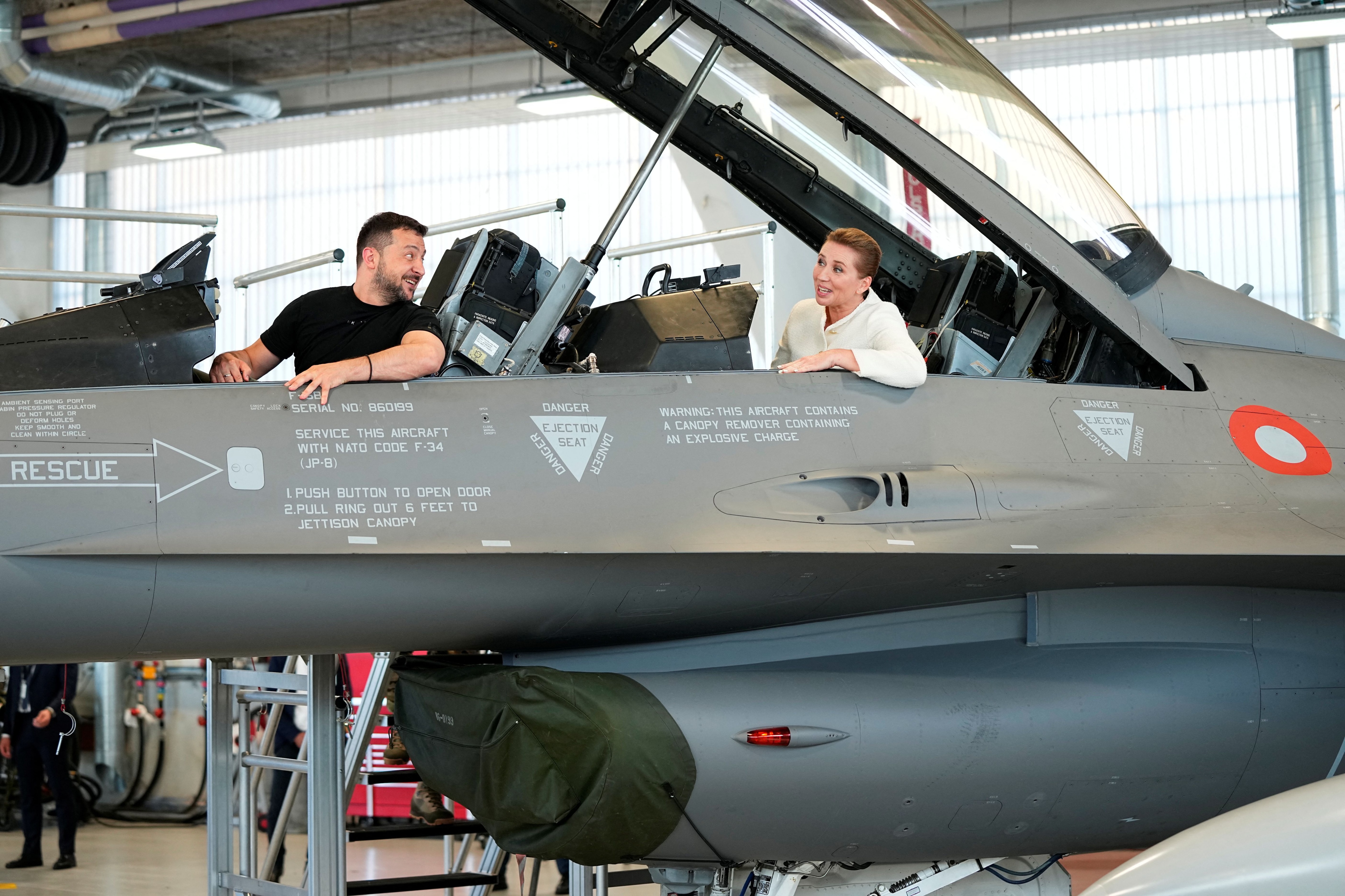 Zelensky and Danish Prime Minister Mette Frederiksen in an F-16 (via Reuters)