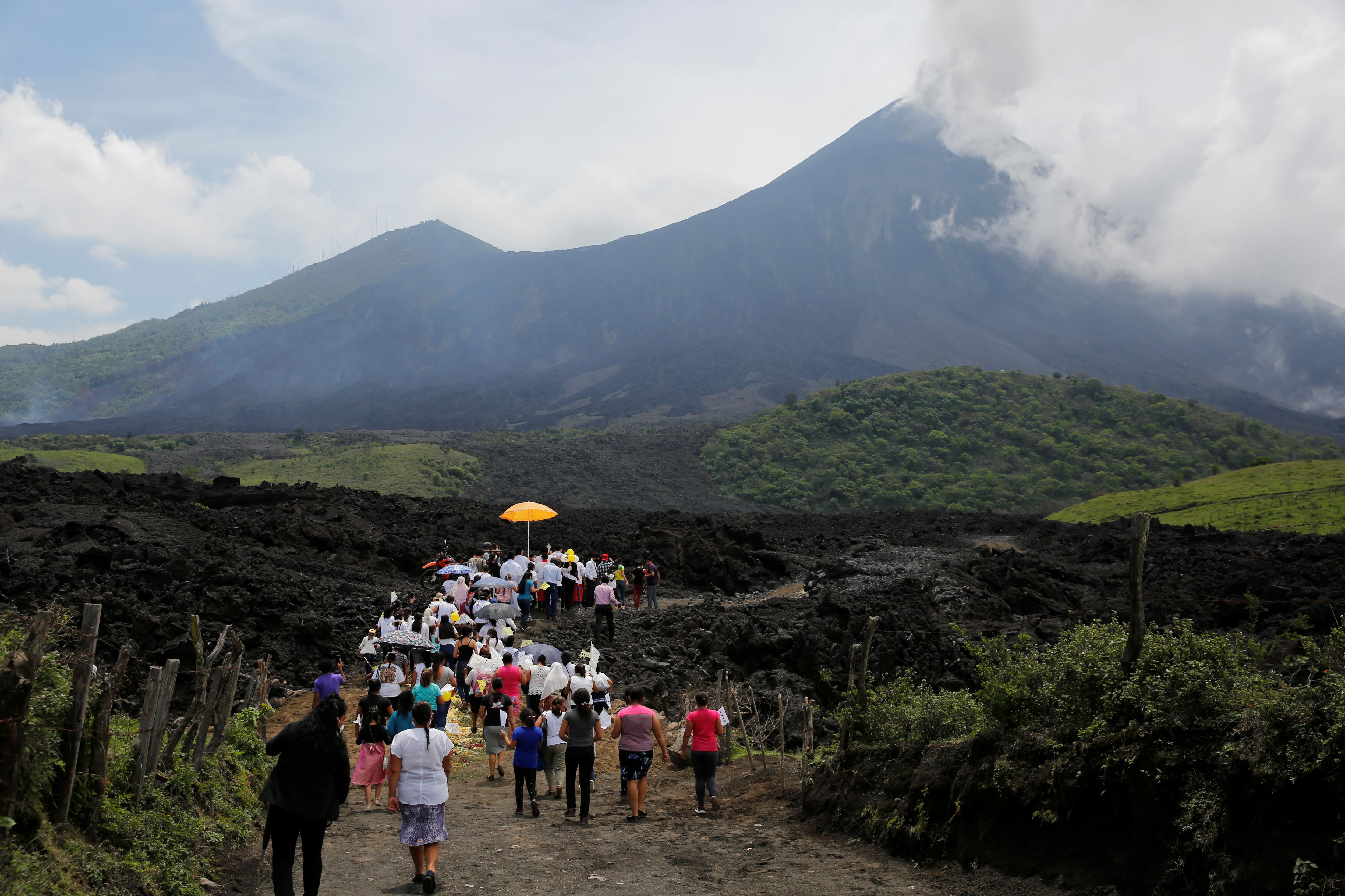 File|  A group of speakers called 'Cenaculos' participating in a procession to the Pacaya volcano in the Escuintla region, Guatemala, May, 2021. (REUTERS/Luis Echeverria)