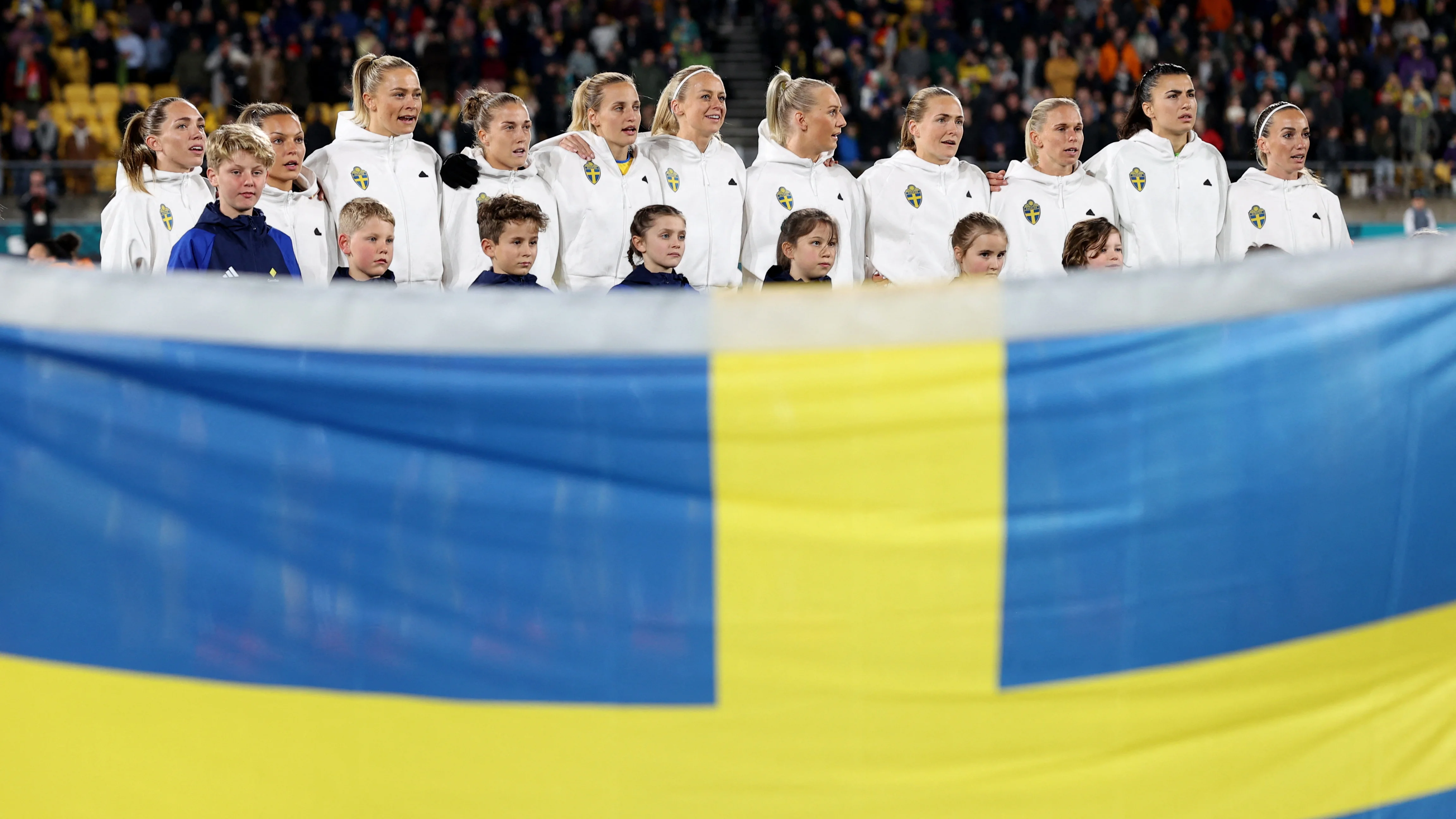 Soccer Football - FIFA Women's World Cup Australia and New Zealand 2023 - Group G - Sweden v Italy - Wellington Regional Stadium, Wellington, New Zealand - July 29, 2023 Sweden players line up during the national anthems before the match REUTERS/Amanda Perobelli