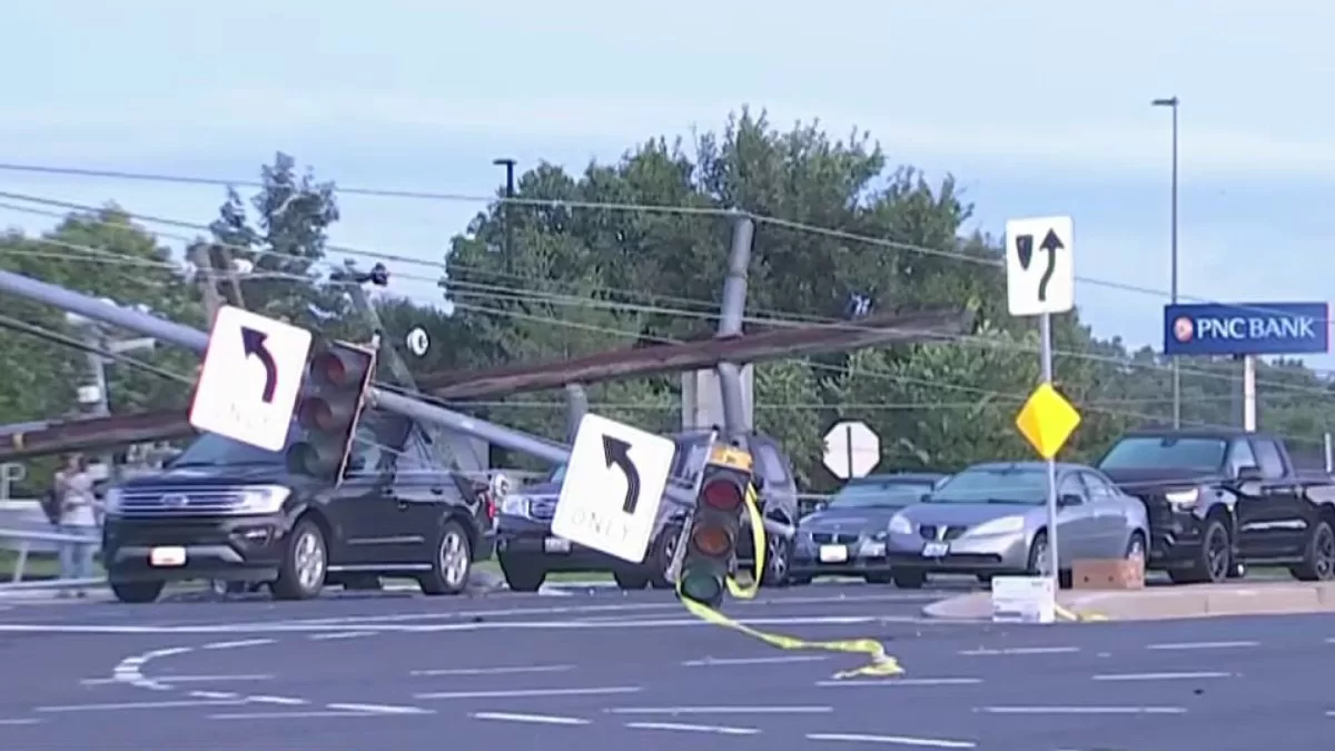 Downed power line leaves drivers trapped during storm in Carroll, Maryland
