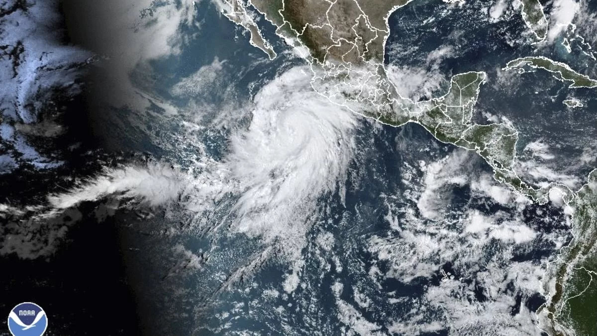Hilary upgrades to a category 2 hurricane in the Pacific but still far from the coast of Mexico
