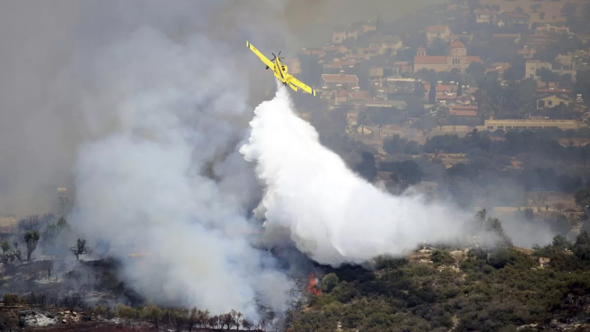 Multinational force helps Cyprus fight persistent fires
