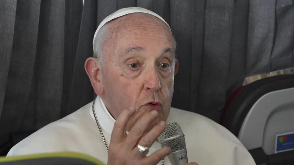 Pope Francis talks about his health and LGBTQ+ Catholics during a conference on the papal plane
