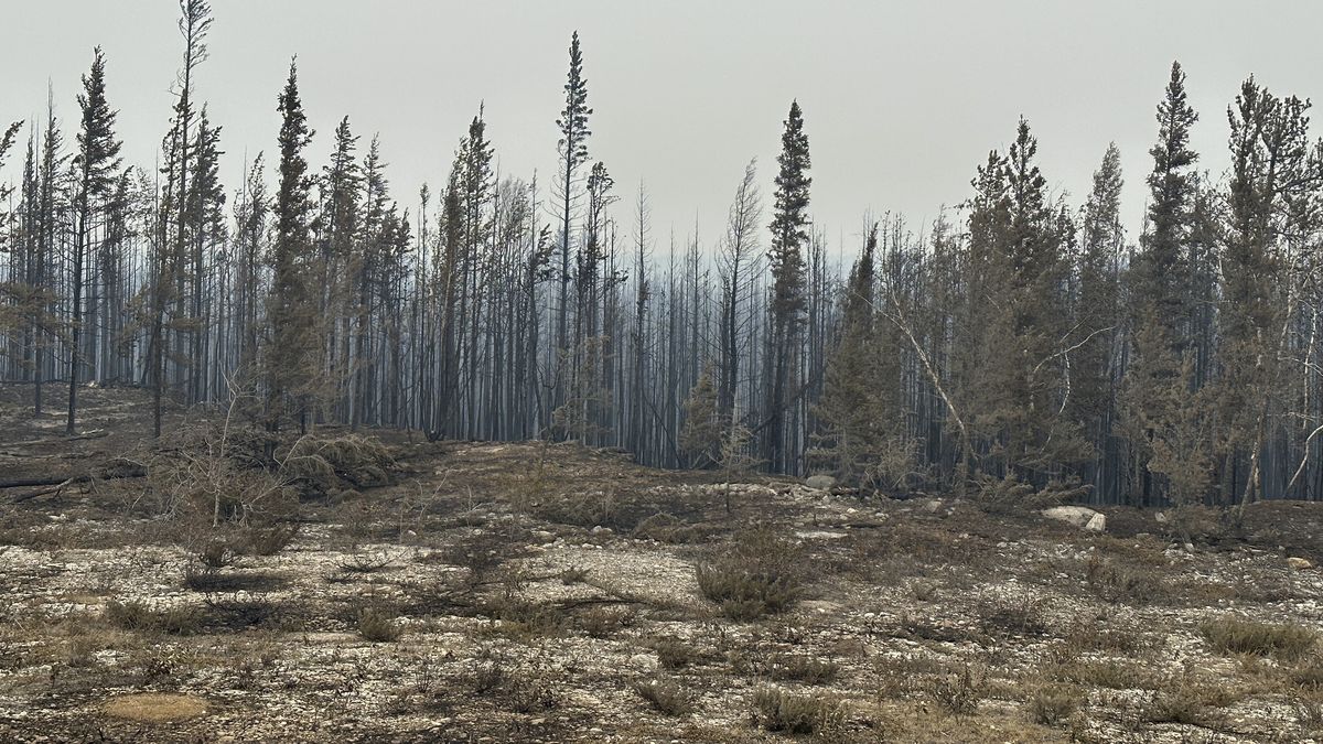 Residents begin to evacuate as fire approaches Canada's Northeast Territories
