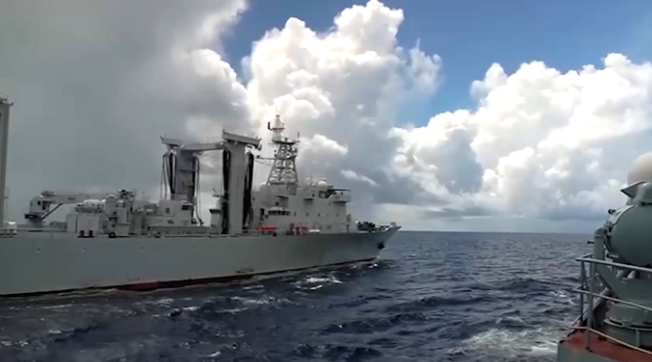 Russian and Chinese warships sail near Japanese islands
