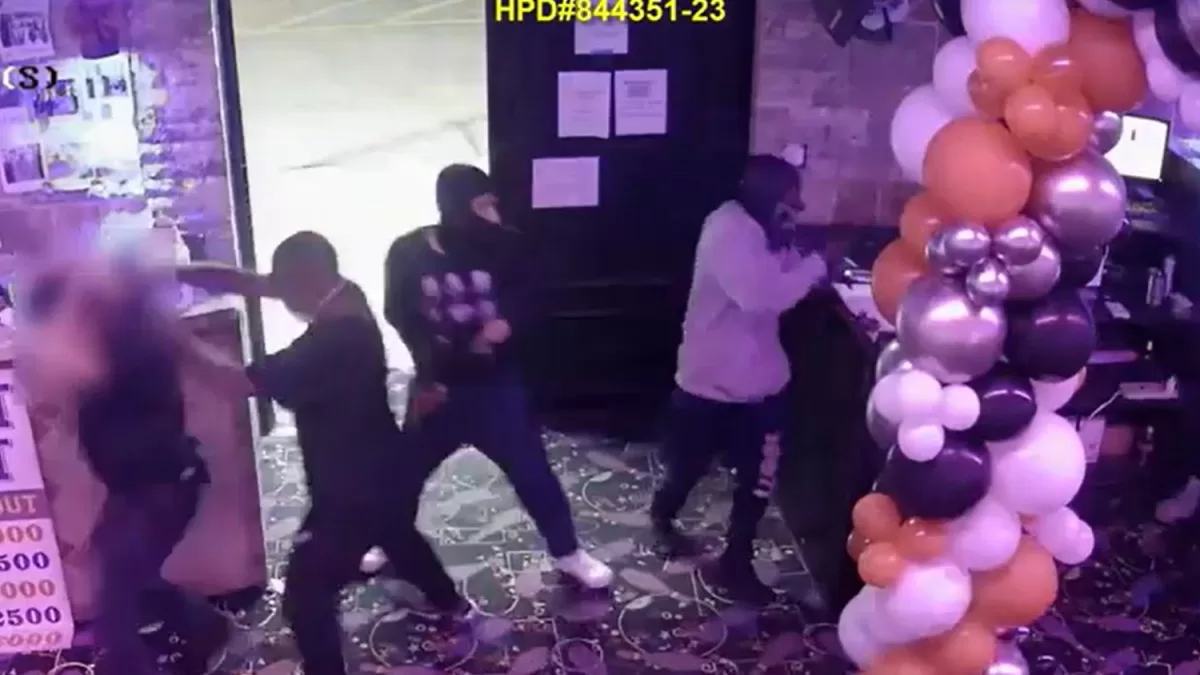 They are looking for four Hispanic suspects in the robbery of an arcade southwest of Houston
