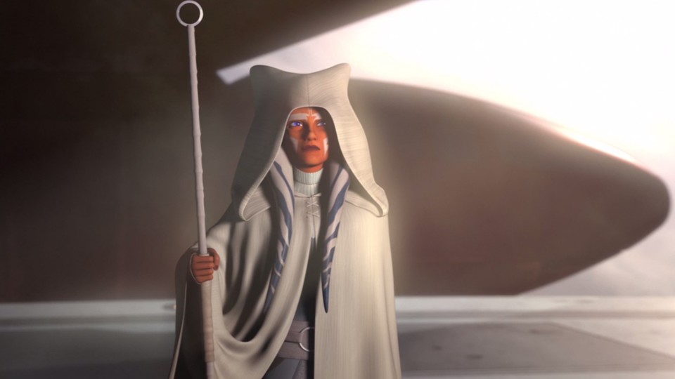 Ahsoka was already seen in her white robe in the finale of Rebels.  Her own series picked up these scenes again, but put Ahsoka back in gray clothes.  Image source: DisneyLucasfilm