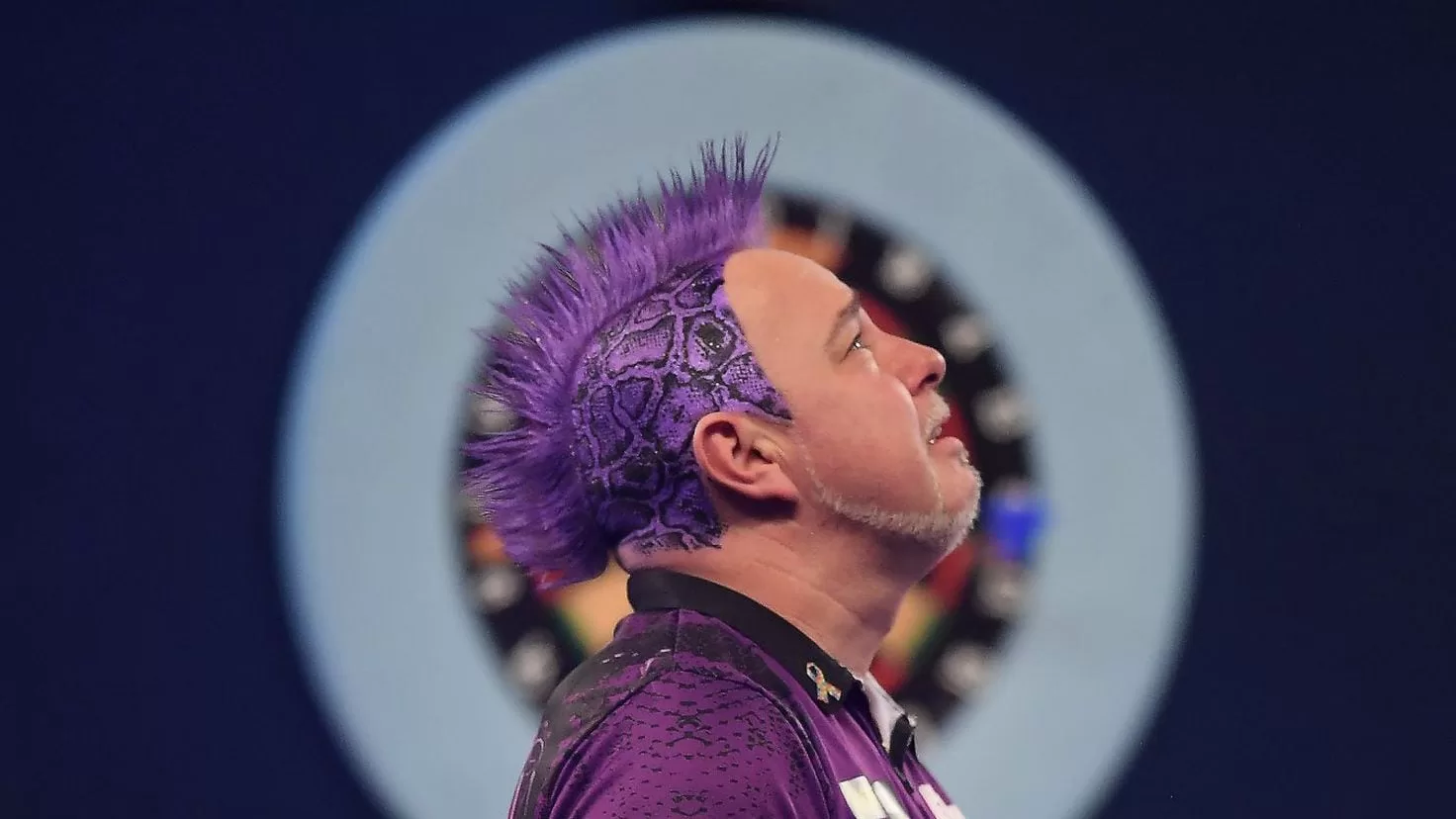 The secret of Peter Wright's eccentric haircuts
