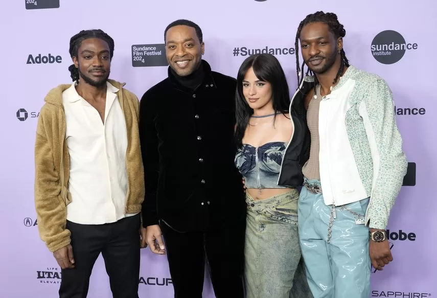 Chiwetel Ejiofor, second from left, writer, screenwriter and director of Rob Peace poses with actors Curt Morlaye, Camila Cabello, and Jay Will at the film's premiere at the Eccles Theater at the Sundance Film Festival on January 22 2024, in Park City, Utah.