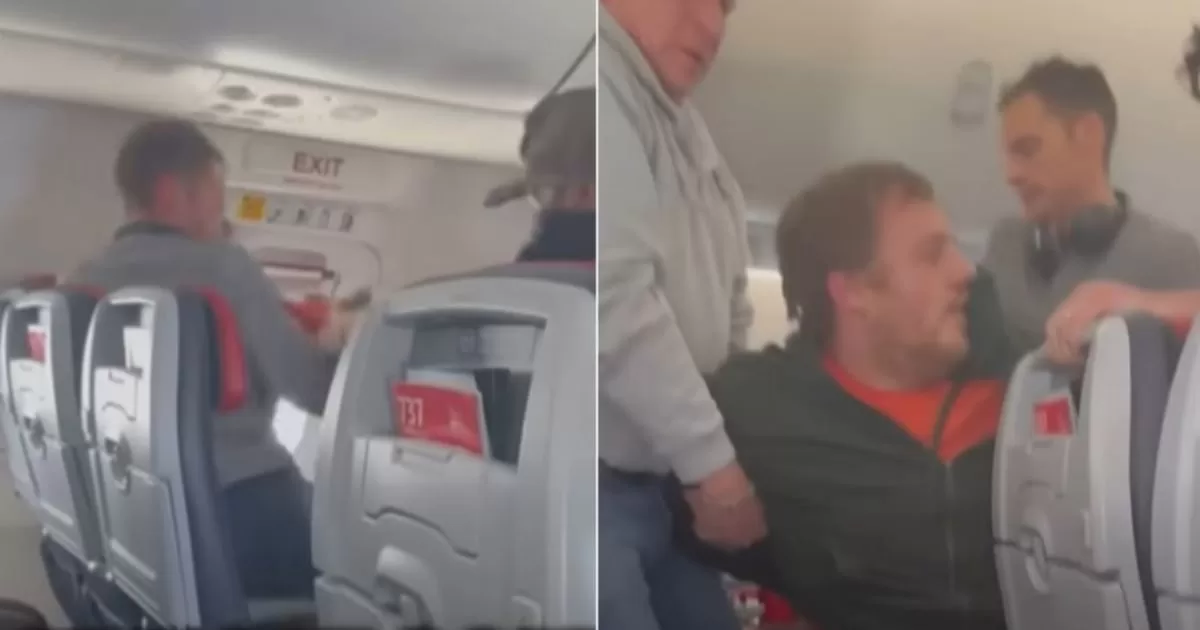 Man tries to open the emergency door of a plane in mid-flight in the US.
