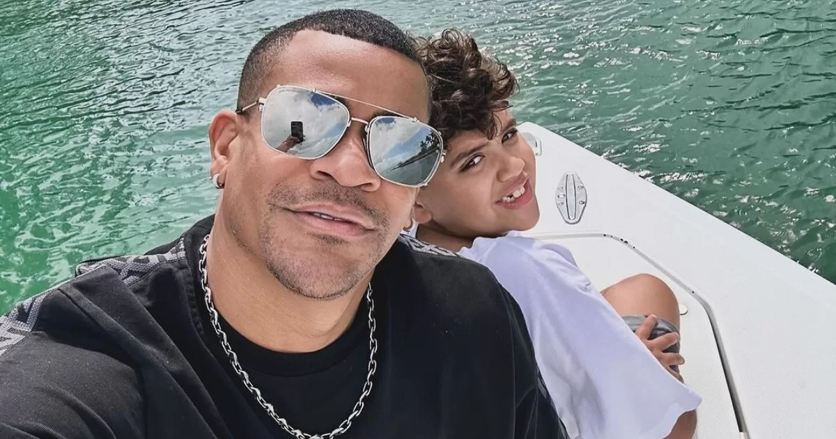 Randy Malcom rides a yacht through Miami to the rhythm of Mawell's "Triple M"
