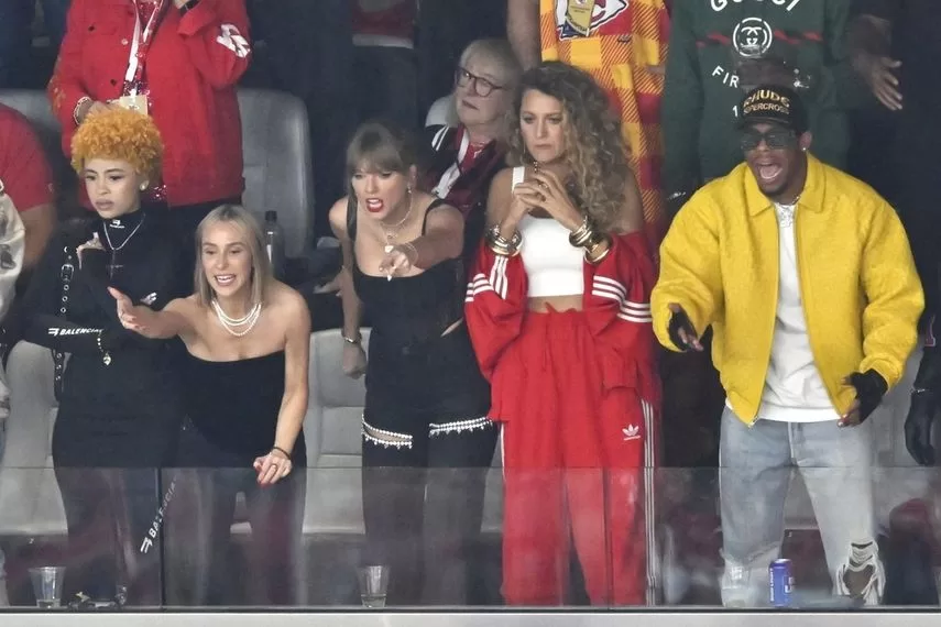 Ice Spice, Ashley Avignone, Taylor Swift and Blake Lively react during the first half of NFL Super Bowl 58 between the San Francisco 49ers and the Kansas City Chiefs on Sunday, Feb. 11, 2024, in Las Vegas.  Donna Kelce watches the game behind them. 