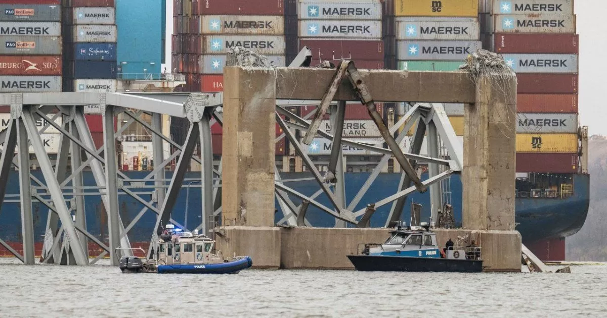 Barges move cranes to Baltimore to remove twisted remains from bridge
