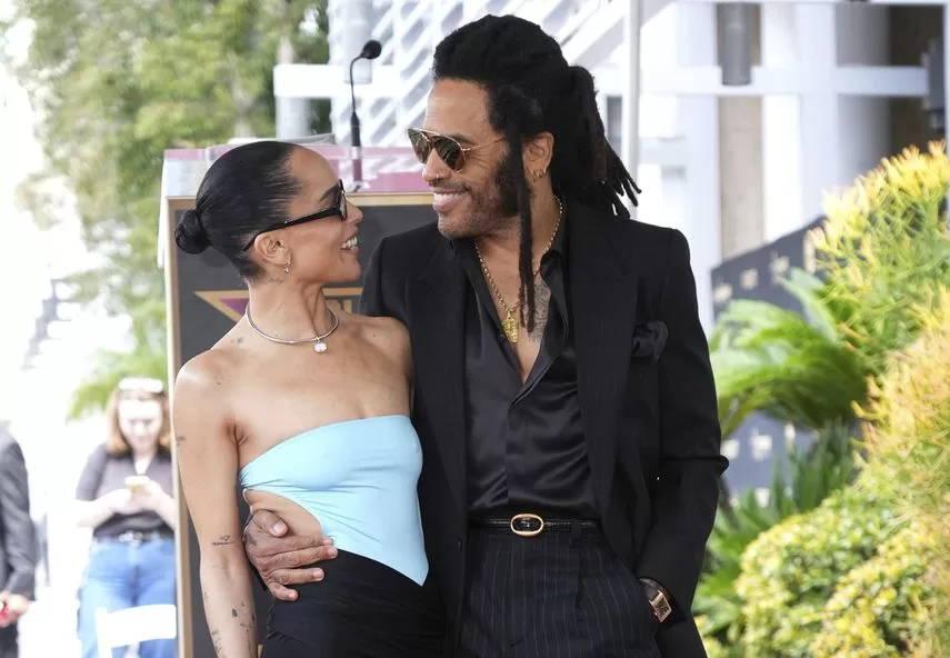 Zoe Kravitz poses with her father, Lenny Kravitz, at a ceremony honoring him with a star on the Hollywood Walk of Fame, Tuesday, March 12, 2024, in Los Angeles. 