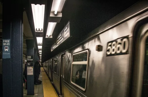 One person dies after being pushed onto the subway tracks
