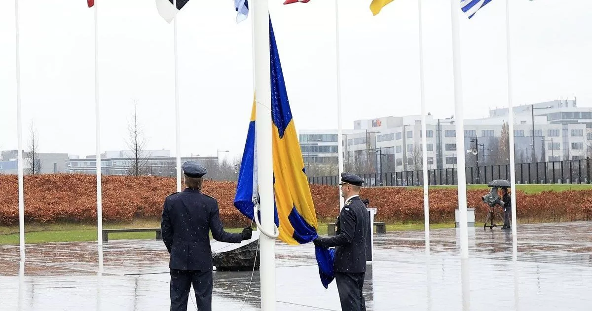 Sweden's flag is raised at NATO headquarters after joining the alliance
