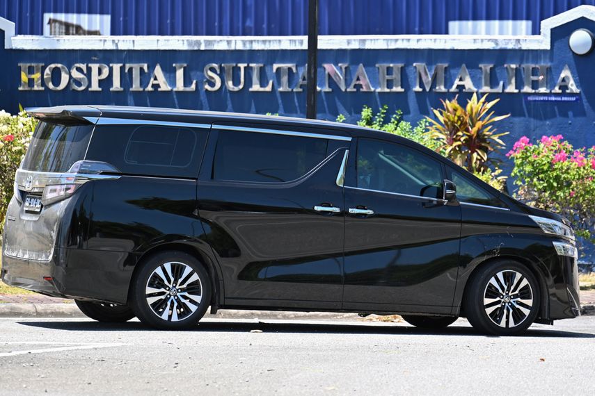 A vehicle with diplomatic registration enters the Sultanah Maliha hospital, where King Harald of Norway was admitted with an infection, on the tourist island of Langkawi, Malaysia, on February 29, 2024.