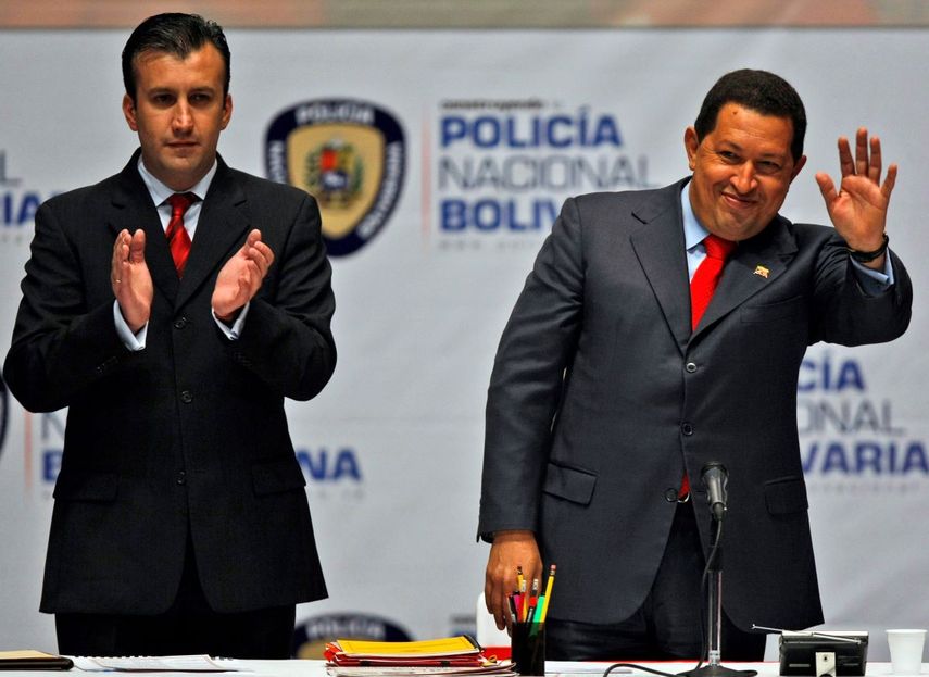 Hugo Chávez greets the audience along with his Minister of the Interior, Tareck El Aissami, at the launching ceremony of the new Bolivarian National Police in Caracas, Venezuela, on December 4, 2009.