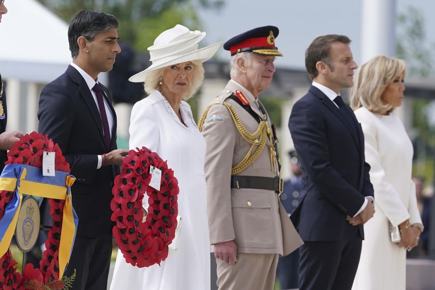 Prime Minister Rishi Sunak, Queen Camilla, King Charles III, French President Emmanuel Macron and Brigitte Macron during the laying of a wreath at the UK's national commemorative event for the 80th anniversary of D-Day, held at the British Normandy Memorial in Ver-sur-Mer, Normandy, France, June 6, 2024.