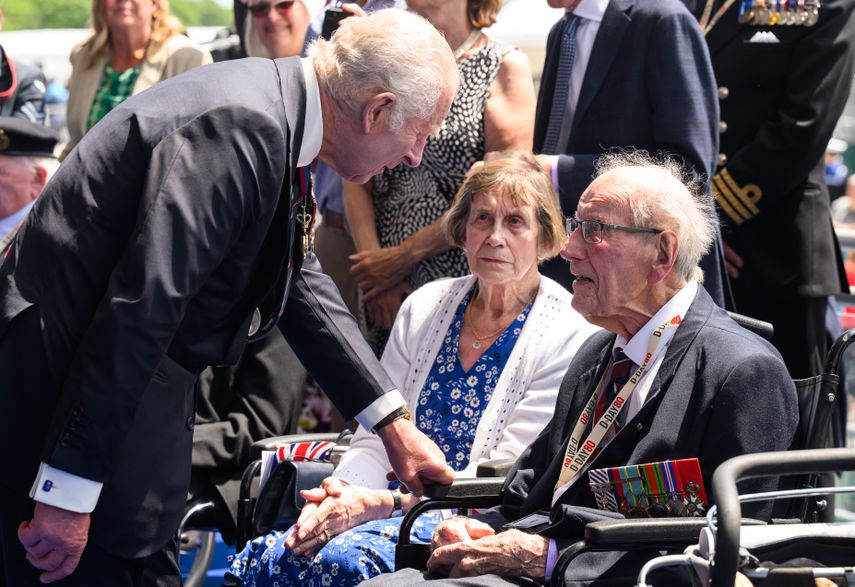 King Charles III talks to Normandy D-Day and Second World War veterans following the UK's national commemorative event to mark the 80th anniversary of the Allied amphibious landings in France in 1944, on Southsea Common, southern England , June 5, 2024.