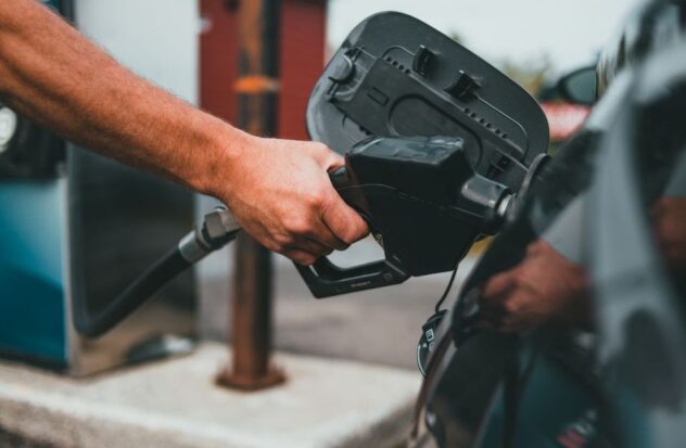 Gasoline prices drop as summer travel season begins