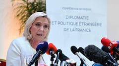 French far-right Rassemblement National (RN) party Member of Parliament and presidential candidate Marine Le Pen holds a press conference on diplomacy and foreign policy in Paris on April 13, 2022, ahead of the second round of France's presidential e
