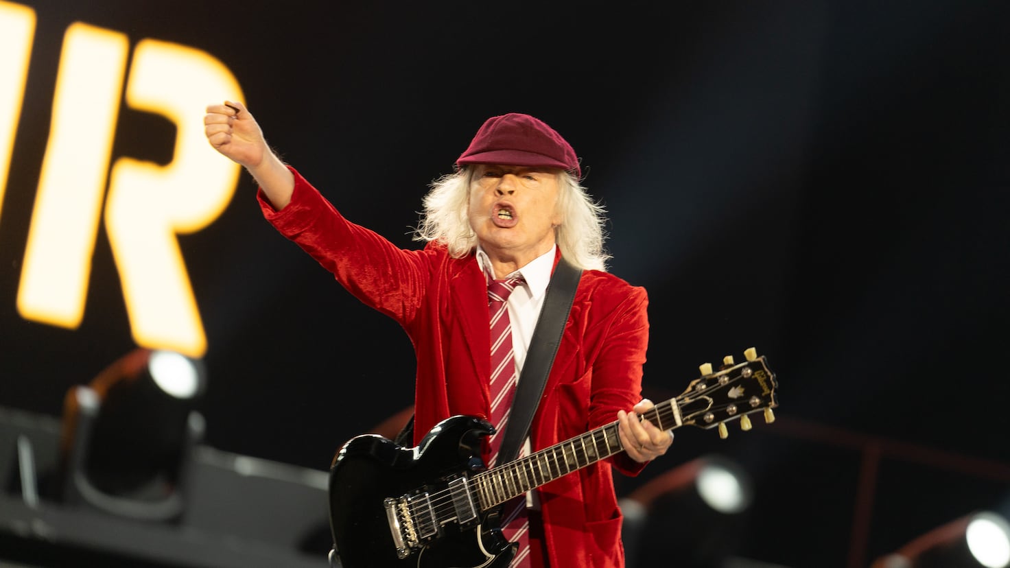 The reason why Angus Young always wears a school uniform at AC/DC concerts

