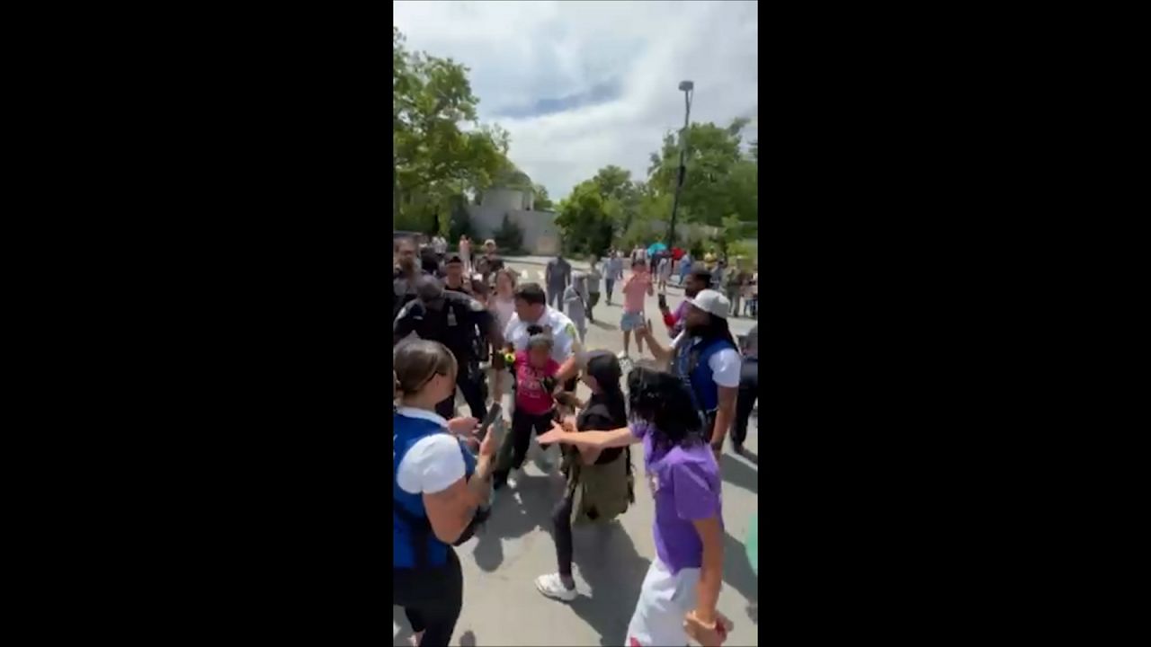  They question official action department.  Parks with migrant girl
