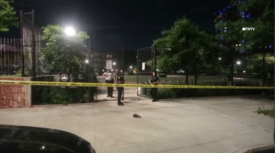 Two girls are injured after a shooting in a park
