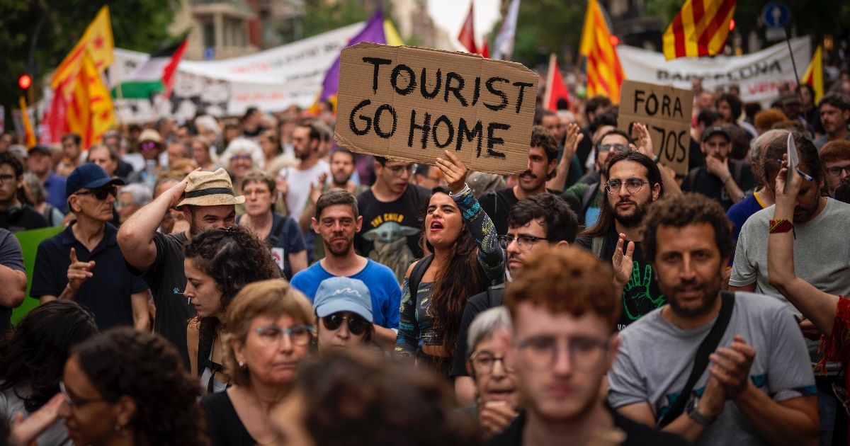 Spain expects record visitor numbers amid protests: Tourists, go home