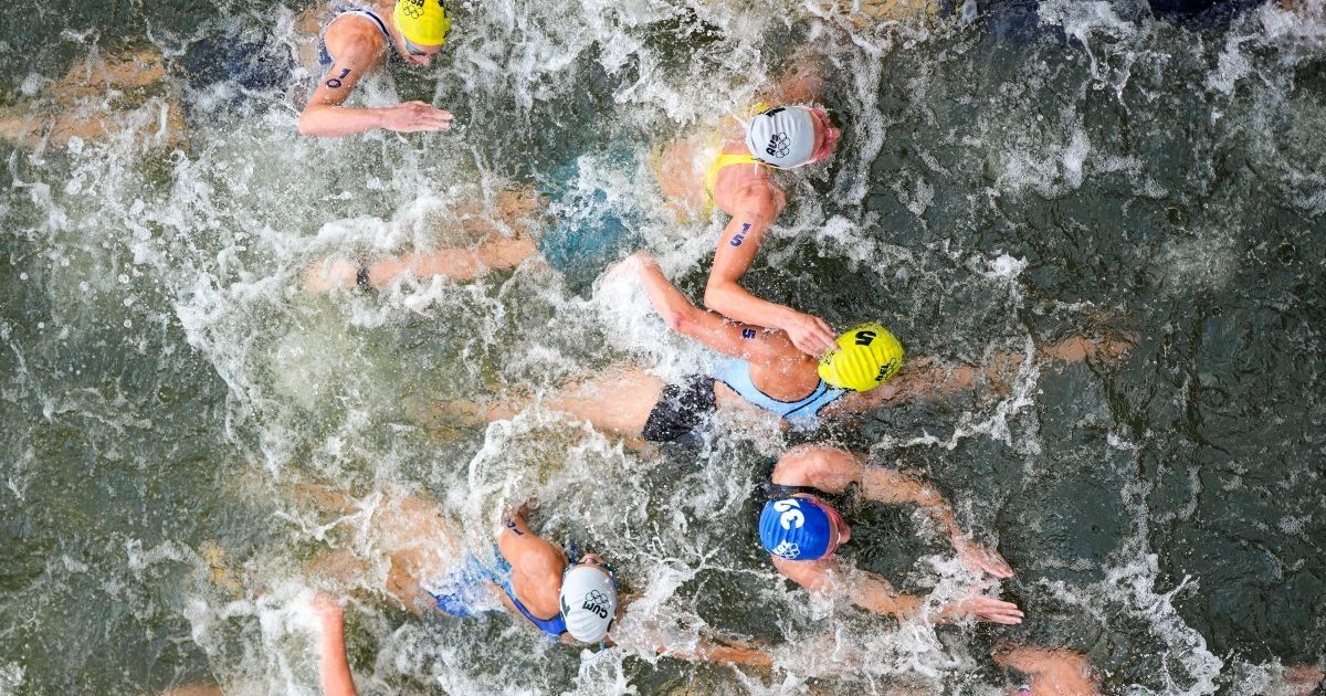 Competitor falls ill after swimming in the Seine River at the Olympics